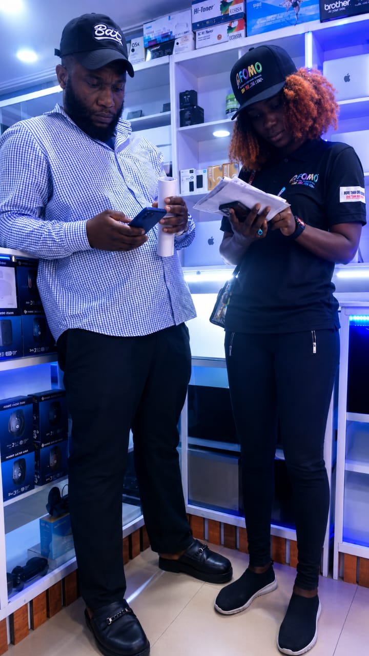 Afomo team at Emab Plaza during pilot launch